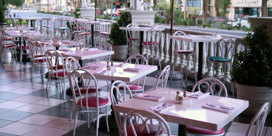 Outdoor patio dining with marble tables
