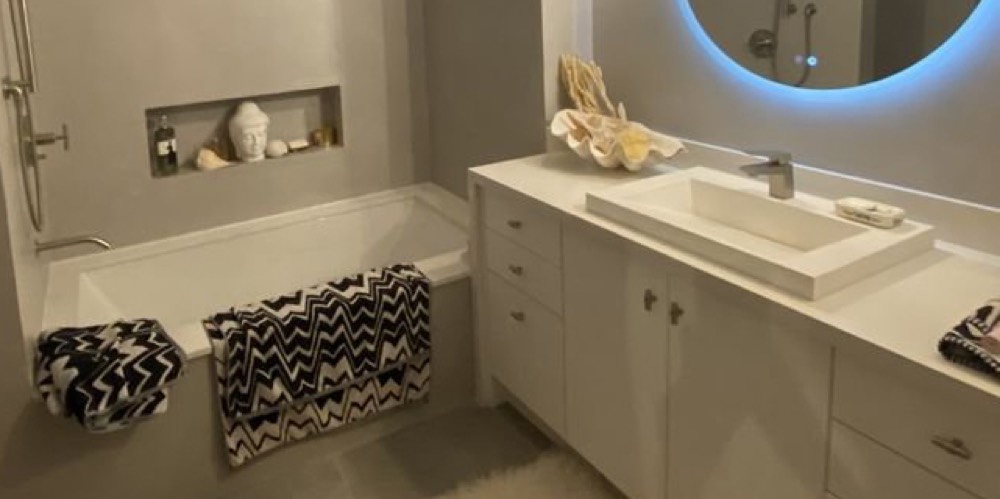 Cultured marble tub and surround